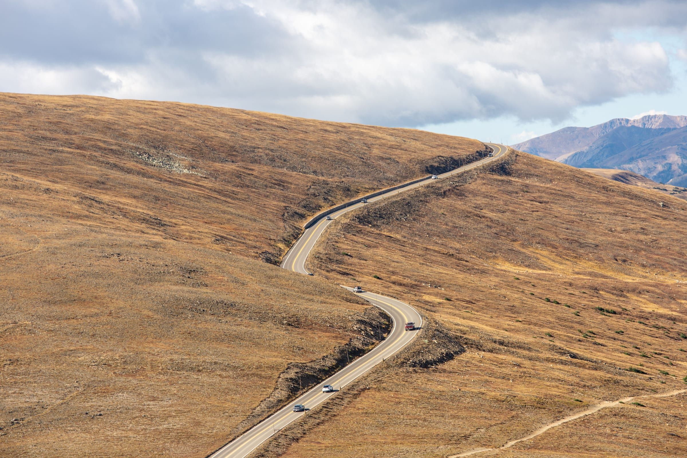 Trail Ridge Road winding across golden tundra